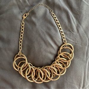 Gold necklace with rings